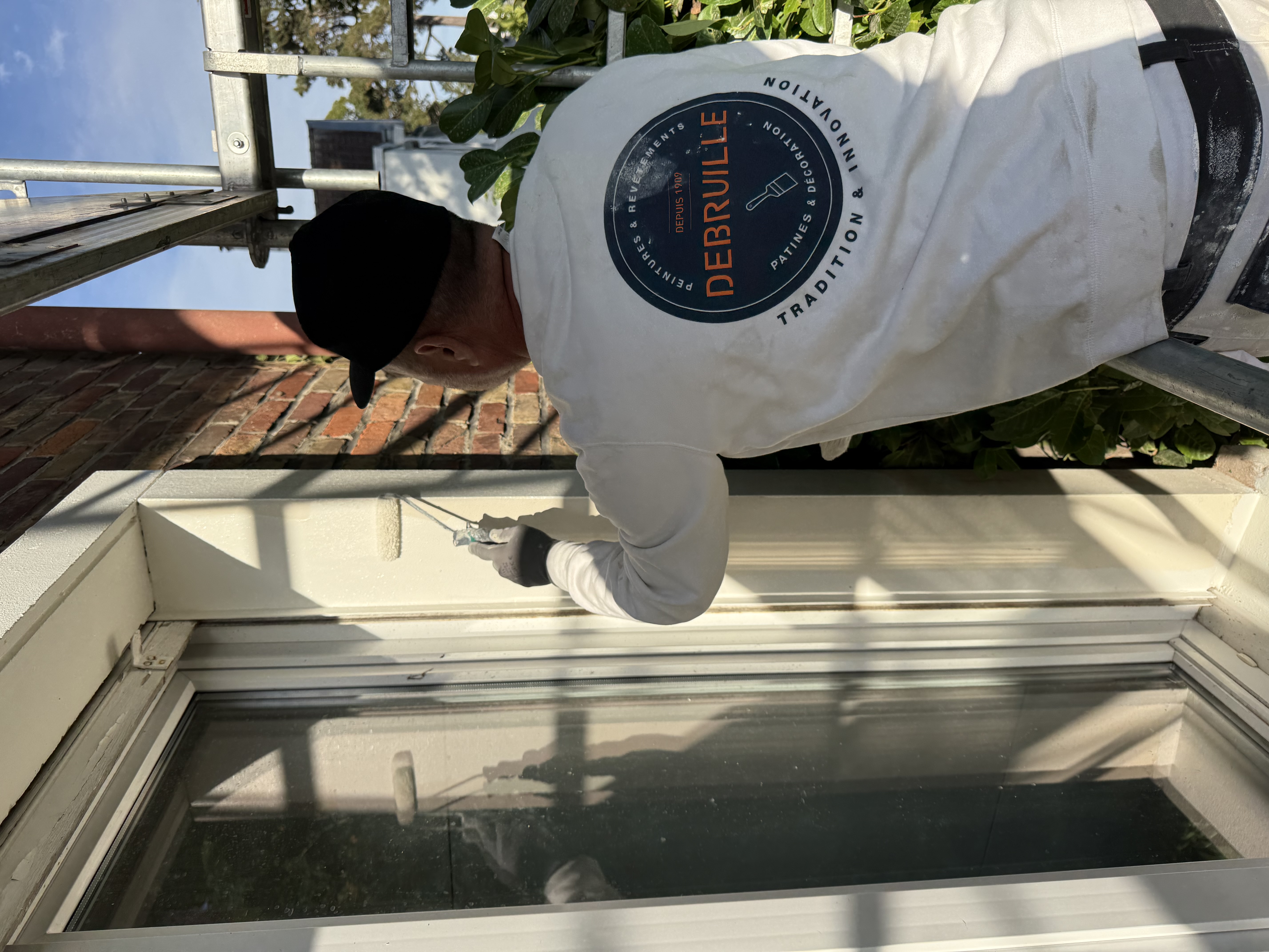 Travaux de peinture sur des boiseries extérieures